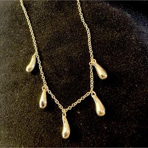 Silver look necklace.